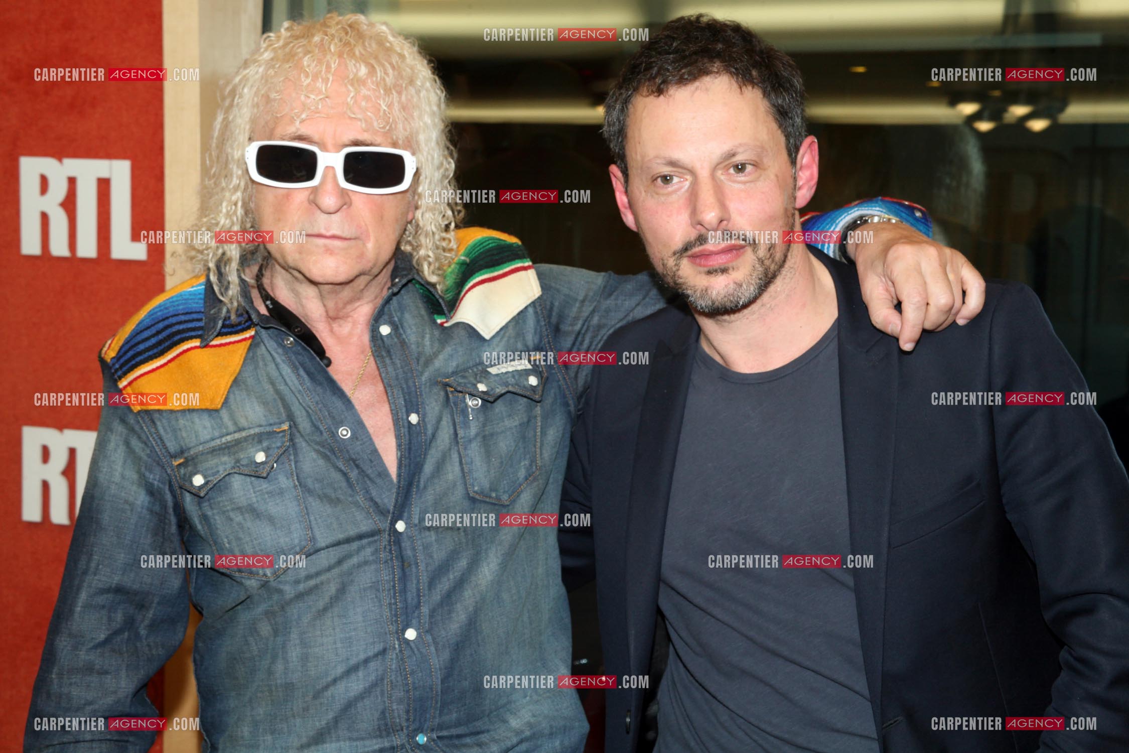 Michel Polnareff et Olivier Fogiel dans les locaux de  RTL.