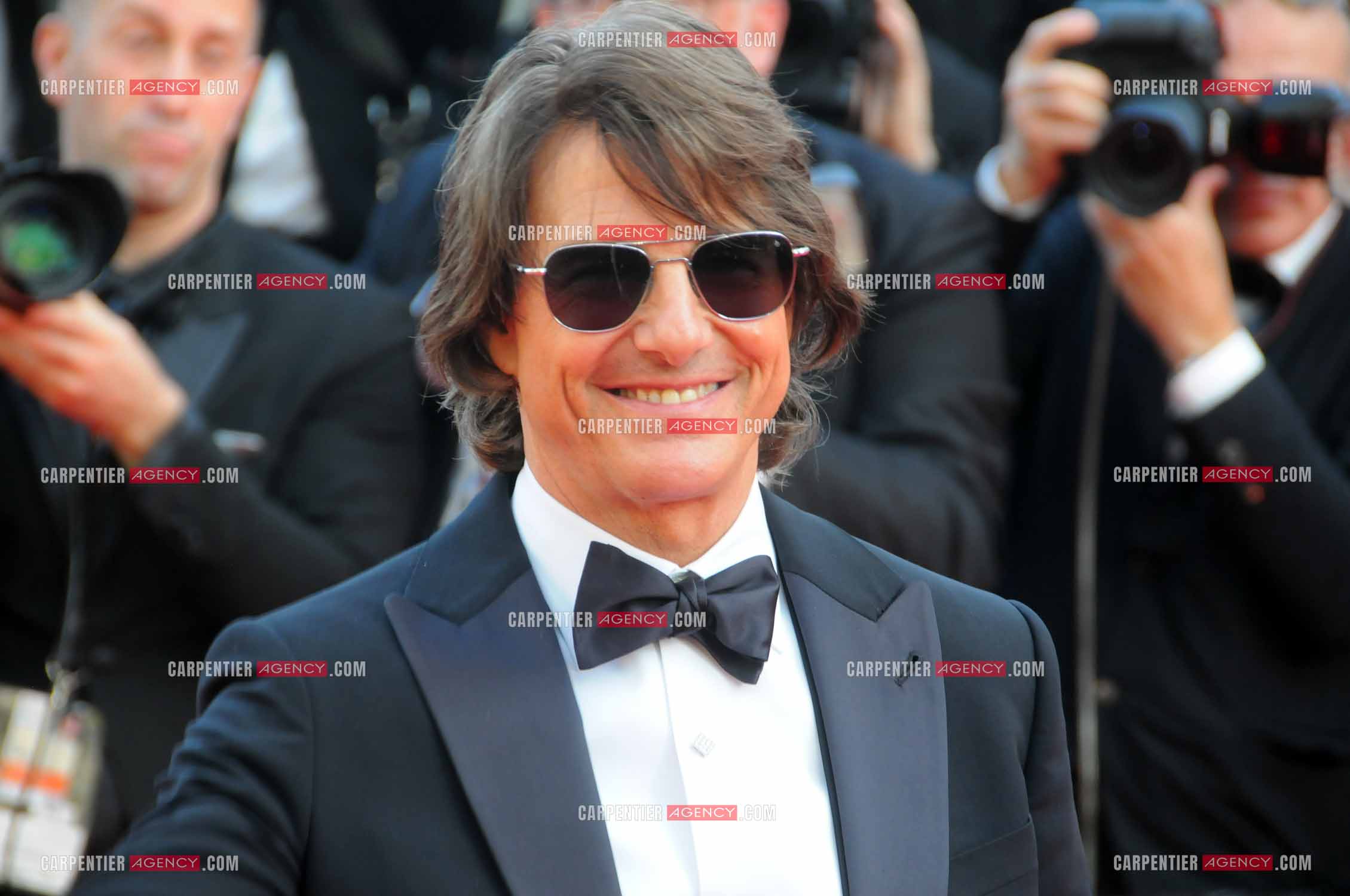 Tom Cruise arrive à l'avant-première du film  "Mission Impossible The Final Reckoning" au 78e Festival de Cannes  le 14 mai 2025 à Cannes.