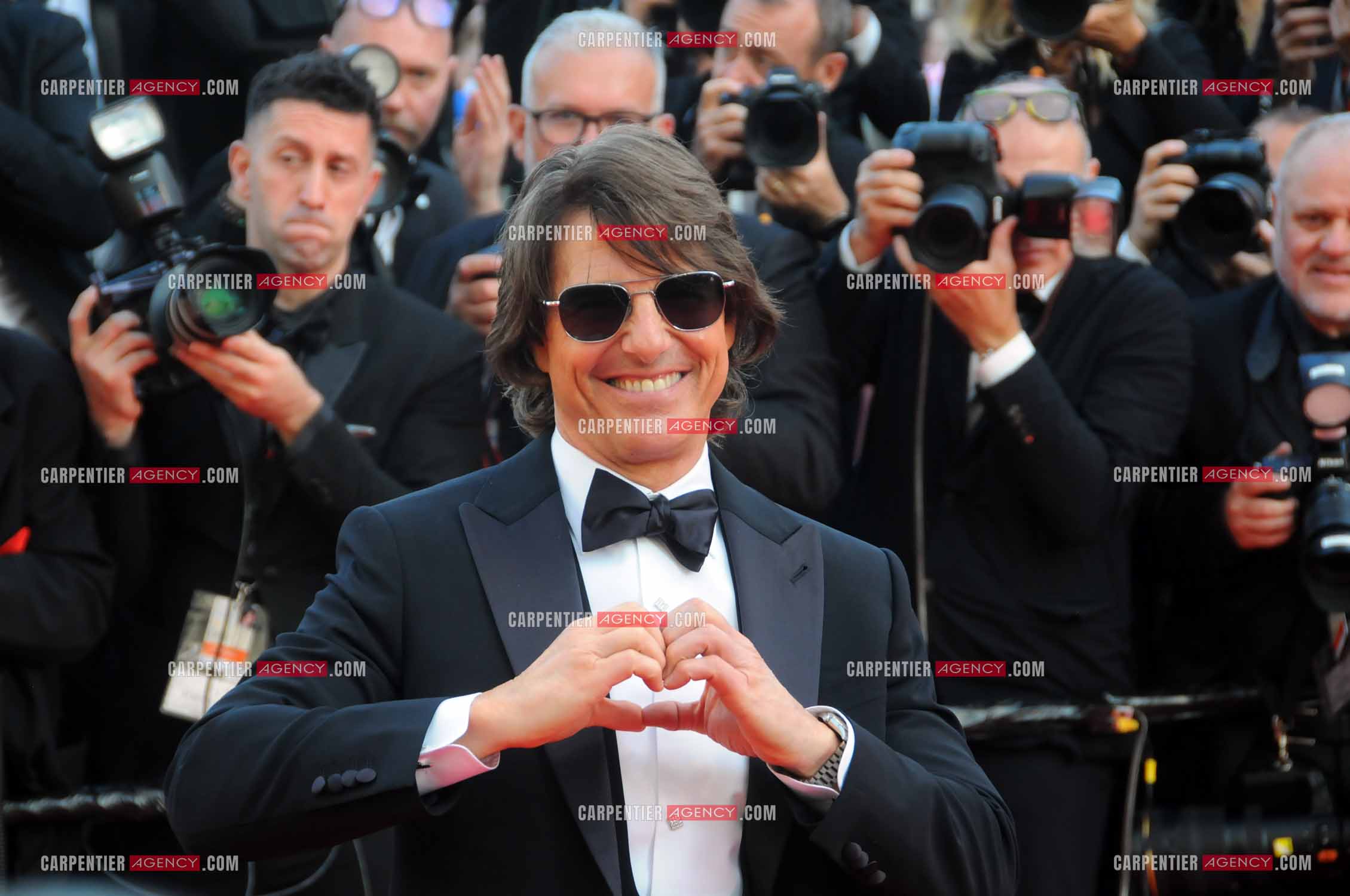 Tom Cruise arrive à l'avant-première du film  "Mission Impossible The Final Reckoning" au 78e Festival de Cannes  le 14 mai 2025 à Cannes.
