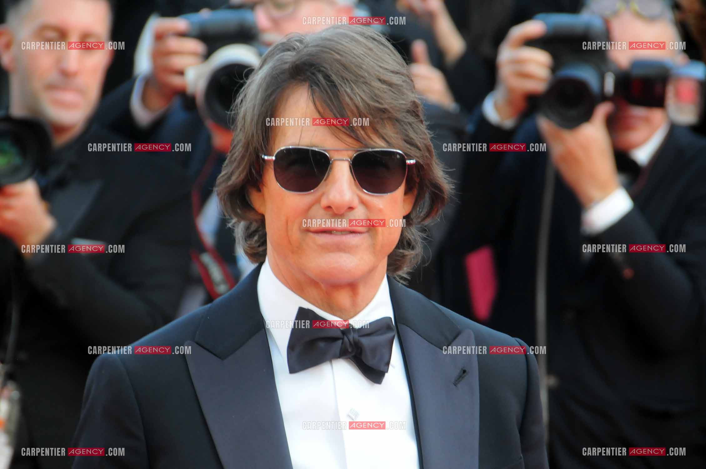 Tom Cruise arrive à l'avant-première du film  "Mission Impossible The Final Reckoning" au 78e Festival de Cannes  le 14 mai 2025 à Cannes.