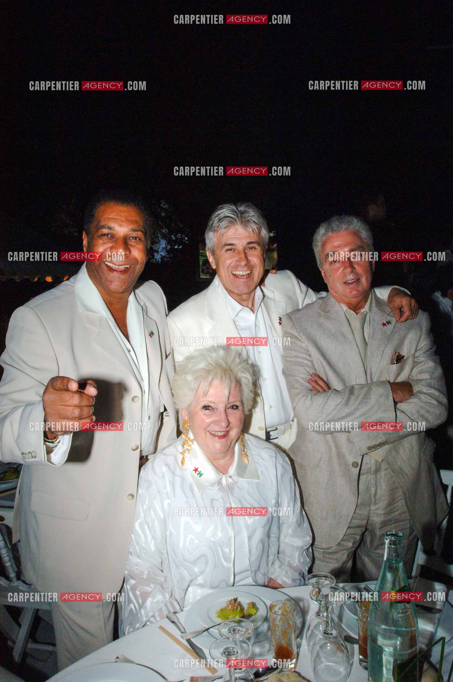 Erick Bamy, Michel Dutheil, Jean Redly et Jacqueline Benoit lors de la soirée blanche en 2005.           ( Exclusif )