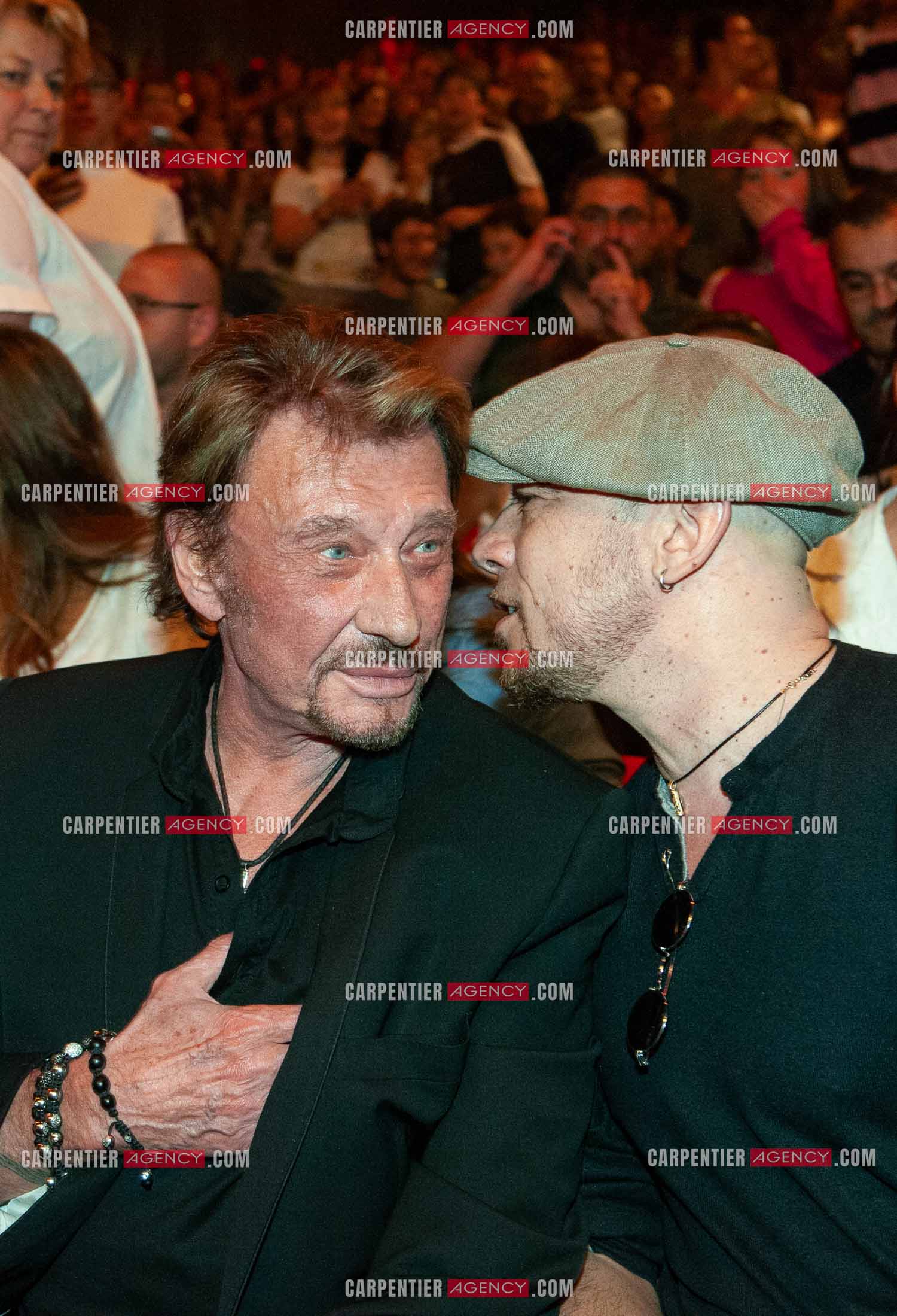 Johnny Hallyday et Pascal Obispo au Zénith de Paris pour assister au concert de leur ami Christophe Maé.                                  ( Exclusif )