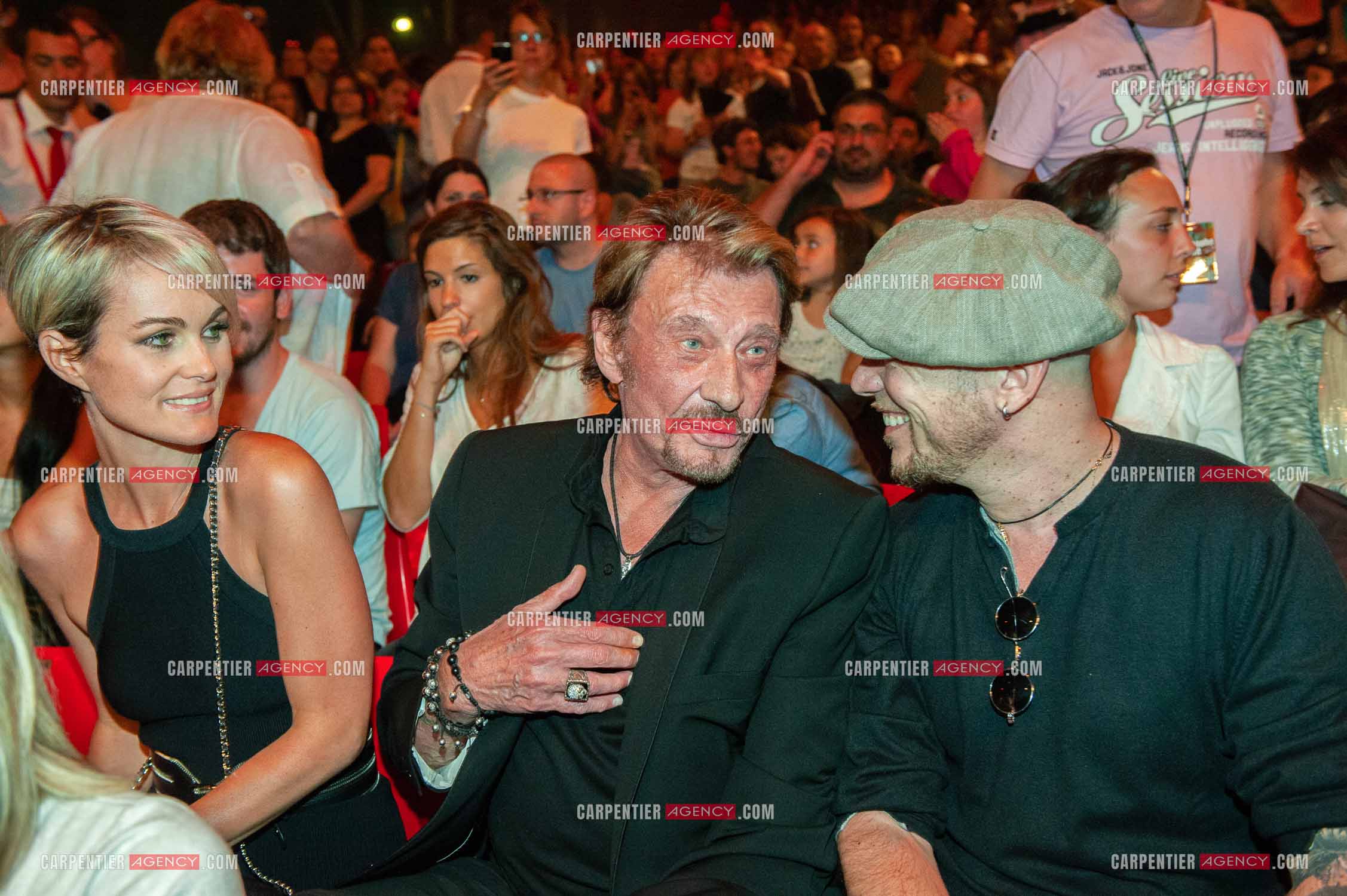 Le chanteur Johnny Hallyday accompagné de son épouse Laeticia Hallyday et de Pascal Obispo au Zénith de Paris pour assister au concert de son ami Christophe Maé.   ( Exclusif )