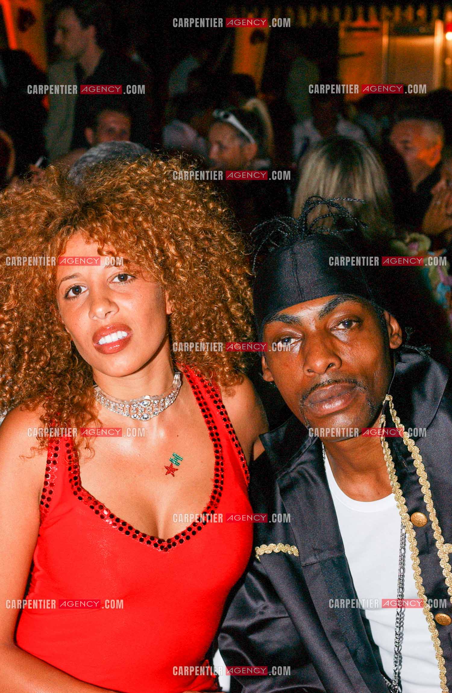 Soirée bal masqué à St Tropez. La chanteuse Afida Turner ( Lesly dans Loft Story 2 ) et le rappeur Coolio, à Saint-Tropez, le 15 août 2004.   ( Exclusif )