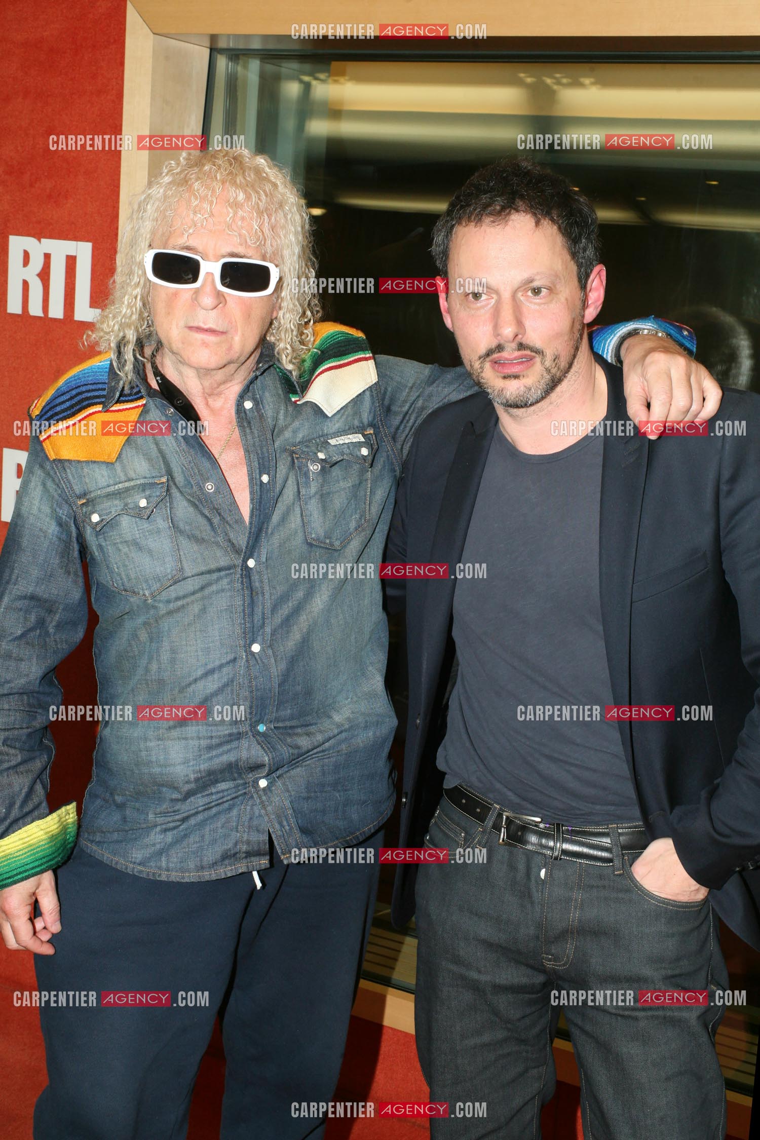 Michel Polnareff et Marc-Olivier Fogiel dans les locaux de  RTL.