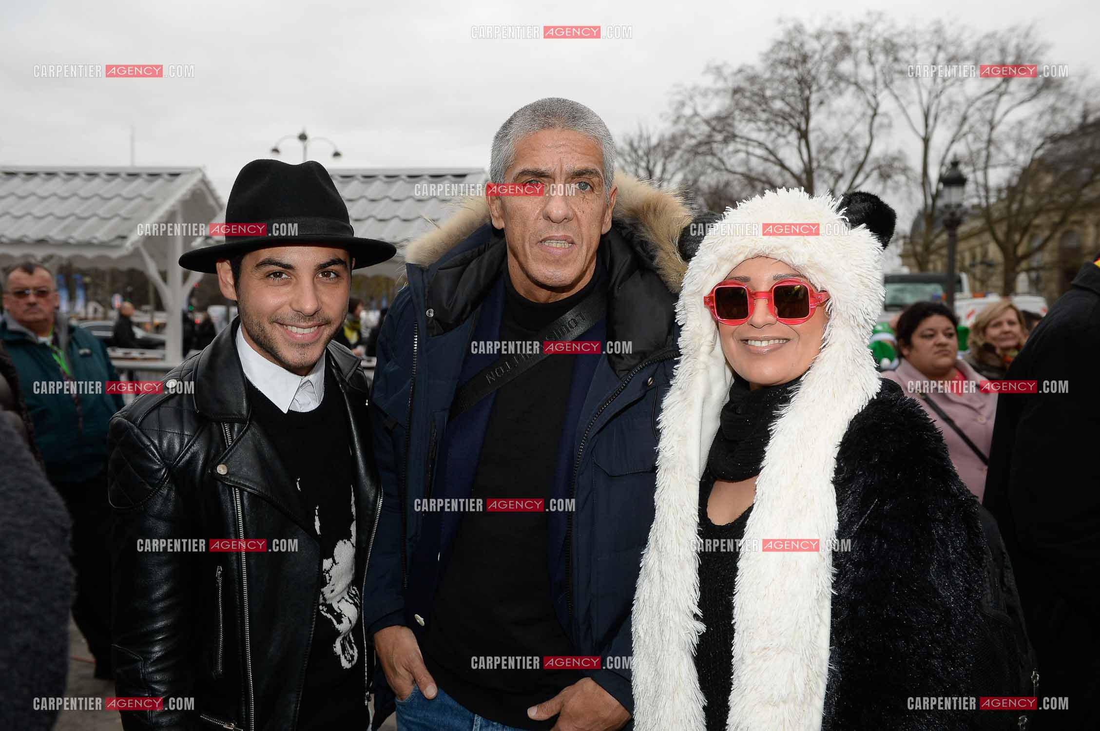 Secours Populaire au marche de Noel sur les Champs Elysees le dimanche 21 Decembre 2014. Alban Bartoli, Samy Naceri, et la chanteuse Laam.