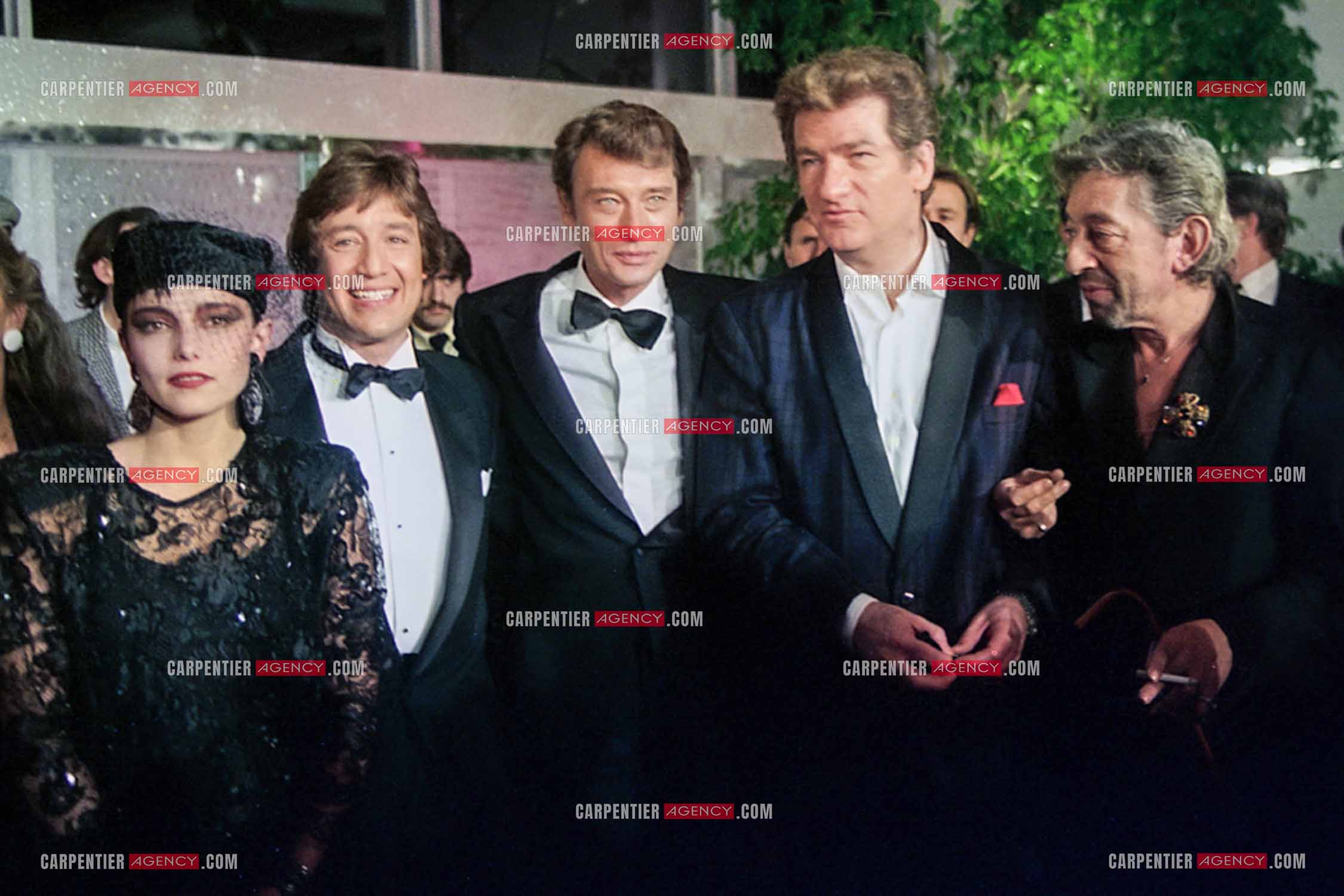 Jeanne Mas, Patrick Sabatier, Johnny Hallyday, Eddy Mitchell et Serge Gainsbourg réunis au Midem pour l'émission " Le jeu de la vérité ".  ( Exclusif )