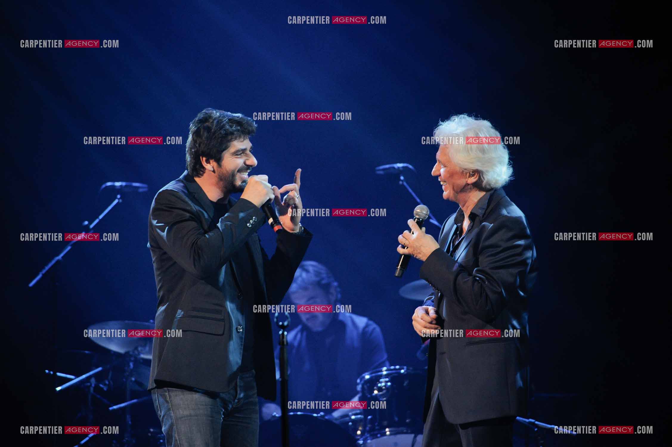 Le chanteur Gérard Lenorman en concert au Grand Rex à Paris. Gérard Lenorman lors d'un duo avec Patrick Fiori.  ( Exclusif )