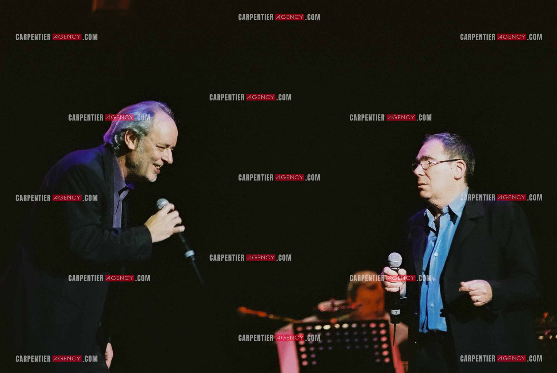 Concert organisé à l'Olympia autour de la guitare. Duo entre Maxime Le Forestier et Claude Nougaro.  ( Exclusif )