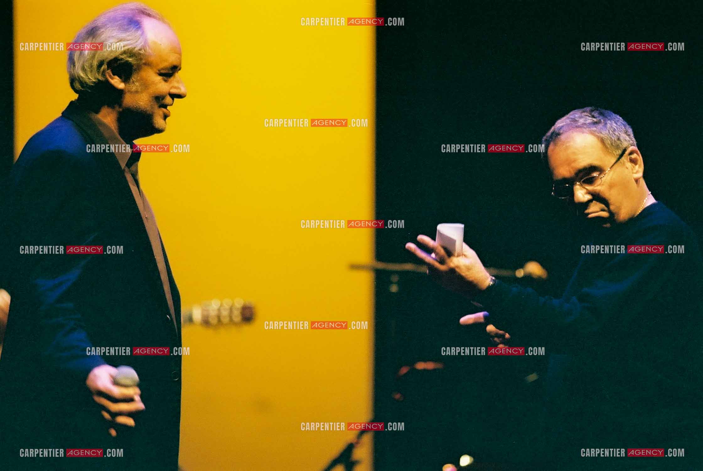 Concert organisé à l'Olympia autour de la guitare. Duo entre Maxime Le Forestier et Claude Nougaro.  ( Exclusif )