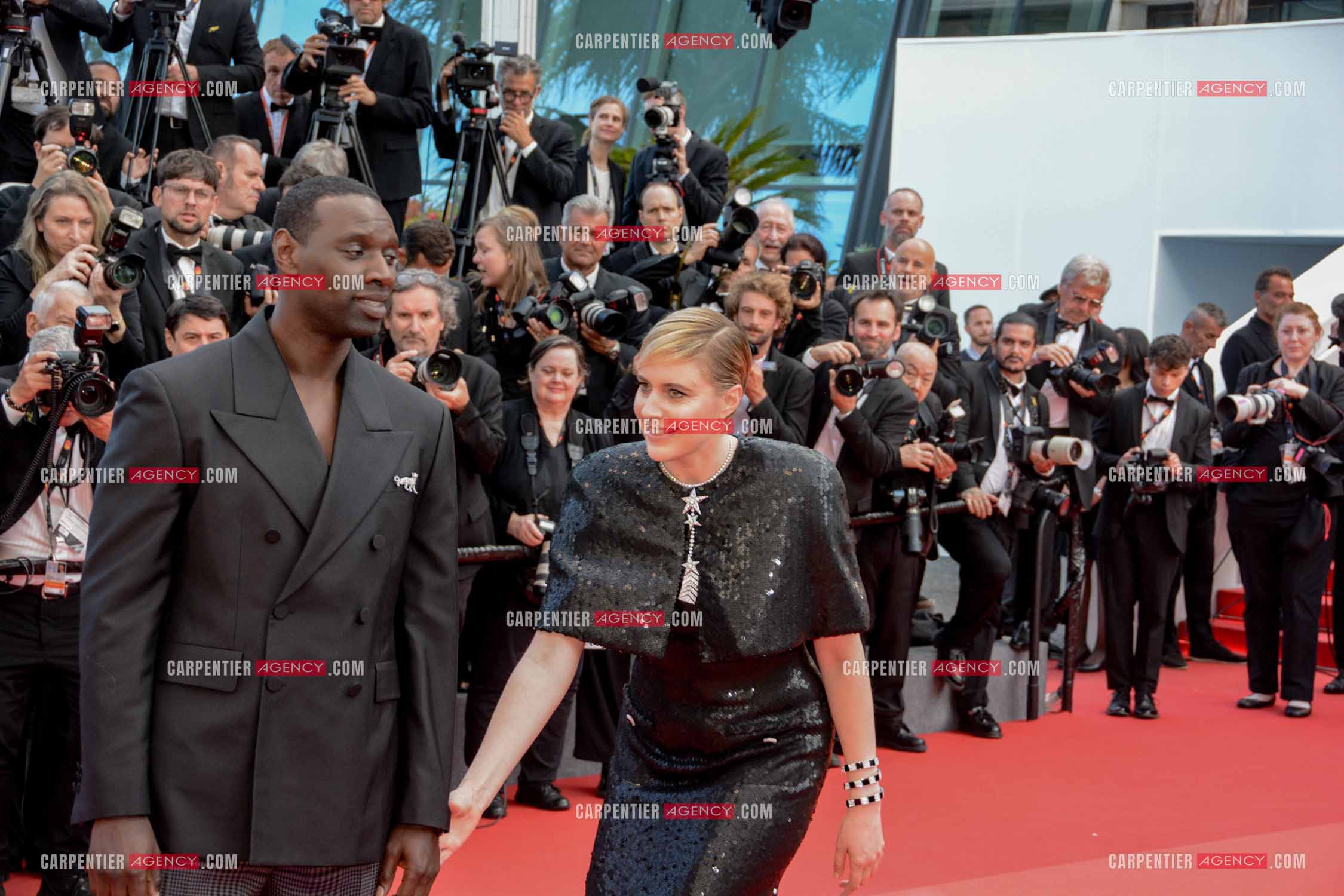 Festival de Cannes 2024. 77e édition du 14 au 25 Mai 2024. Montée des marches du film “ Megalopolis “. L'acteur Omar Sy et l'actrice Greta Gerwig.
