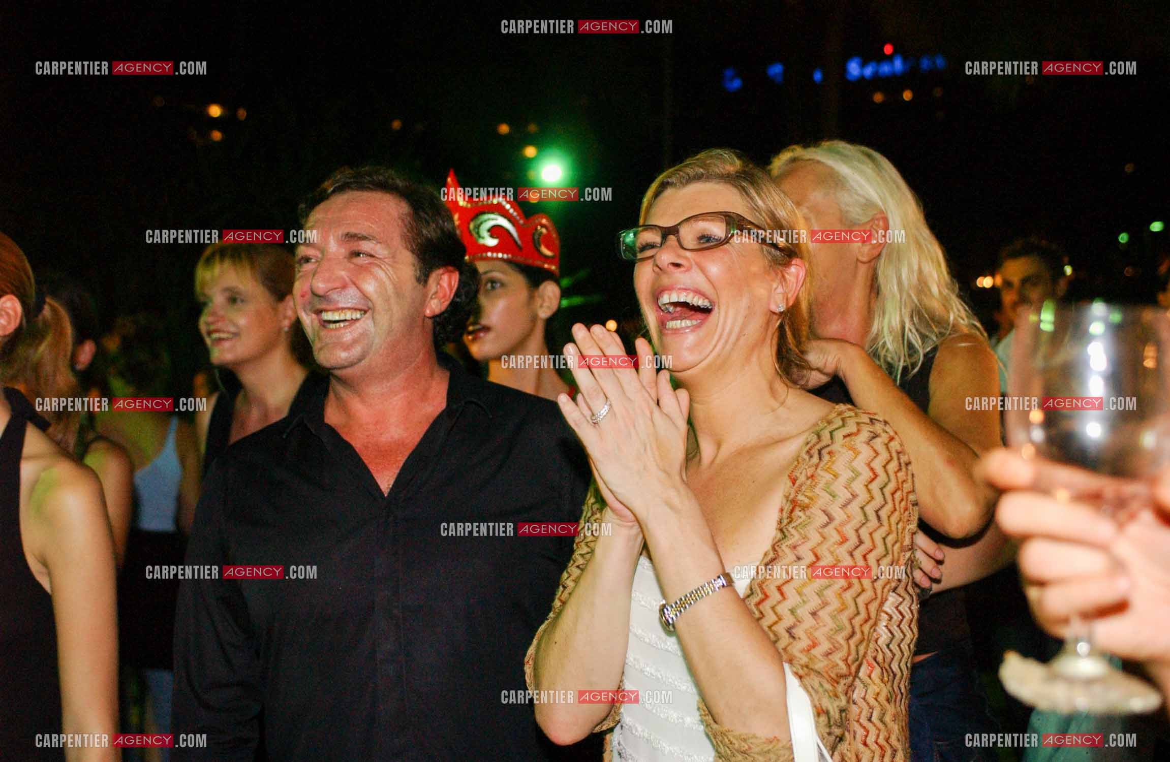 La bookeuse Mickaëla et Gérald Marie Président de Elite Model Management lors de la finale internationnale à Singapour en 2003.   ( Exclusif )