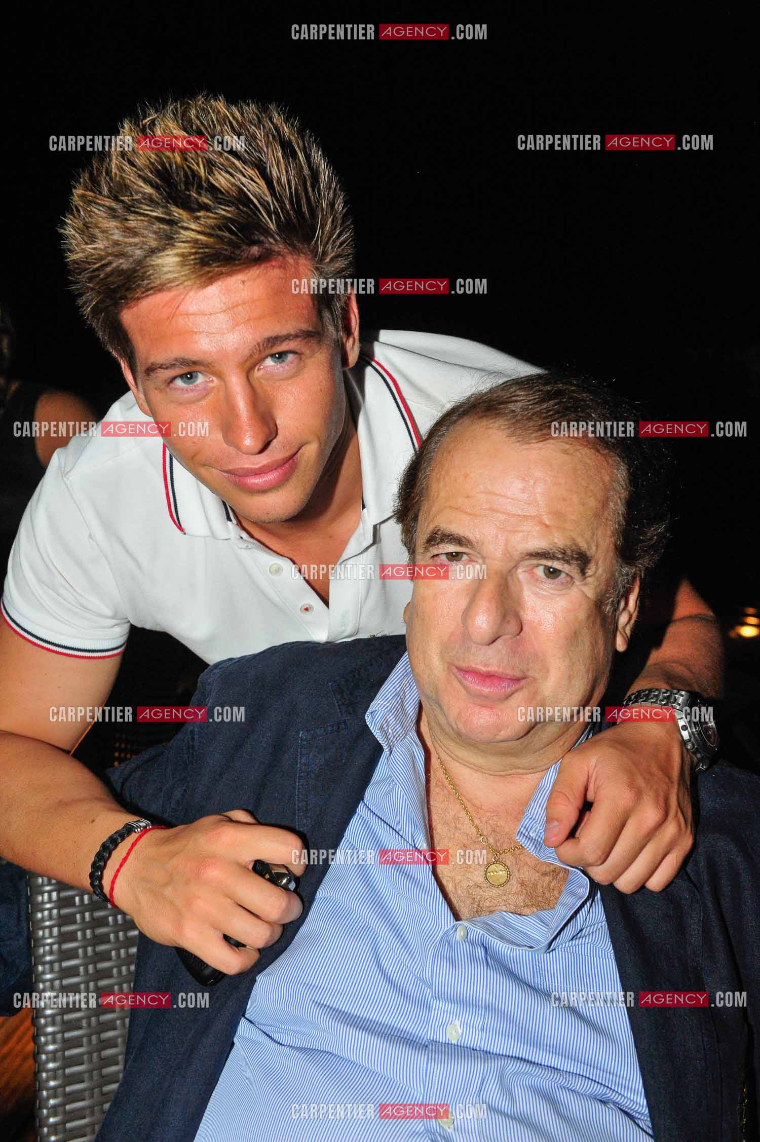 L'écrivain Paul-Loup Sulitzer et sa nouvelle compagne Annabelle Raha au restaurant " LA PERGOLAS “ a Saint-Cloud pour un diner spectacle. Ici, avec le DJ Mickaël Vendetta. ( Exclusif )